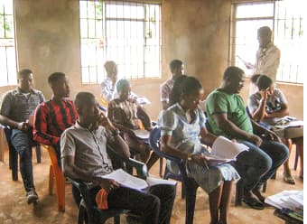 Young people attending an IRAID learning session