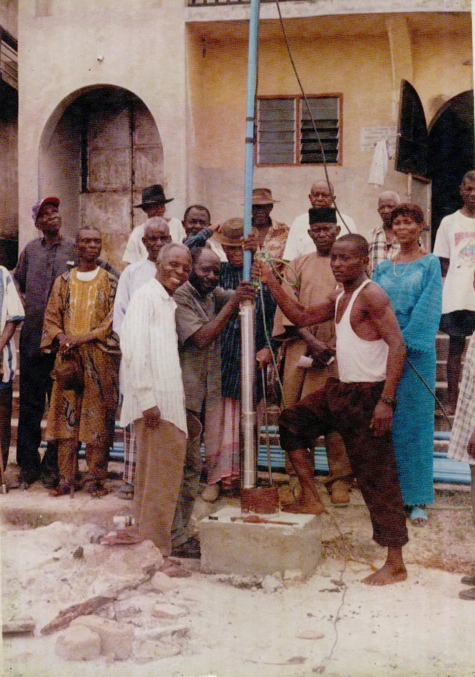 Community members gathered around a newly installed water point