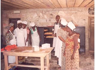 Young women acquiring skills in bakery.